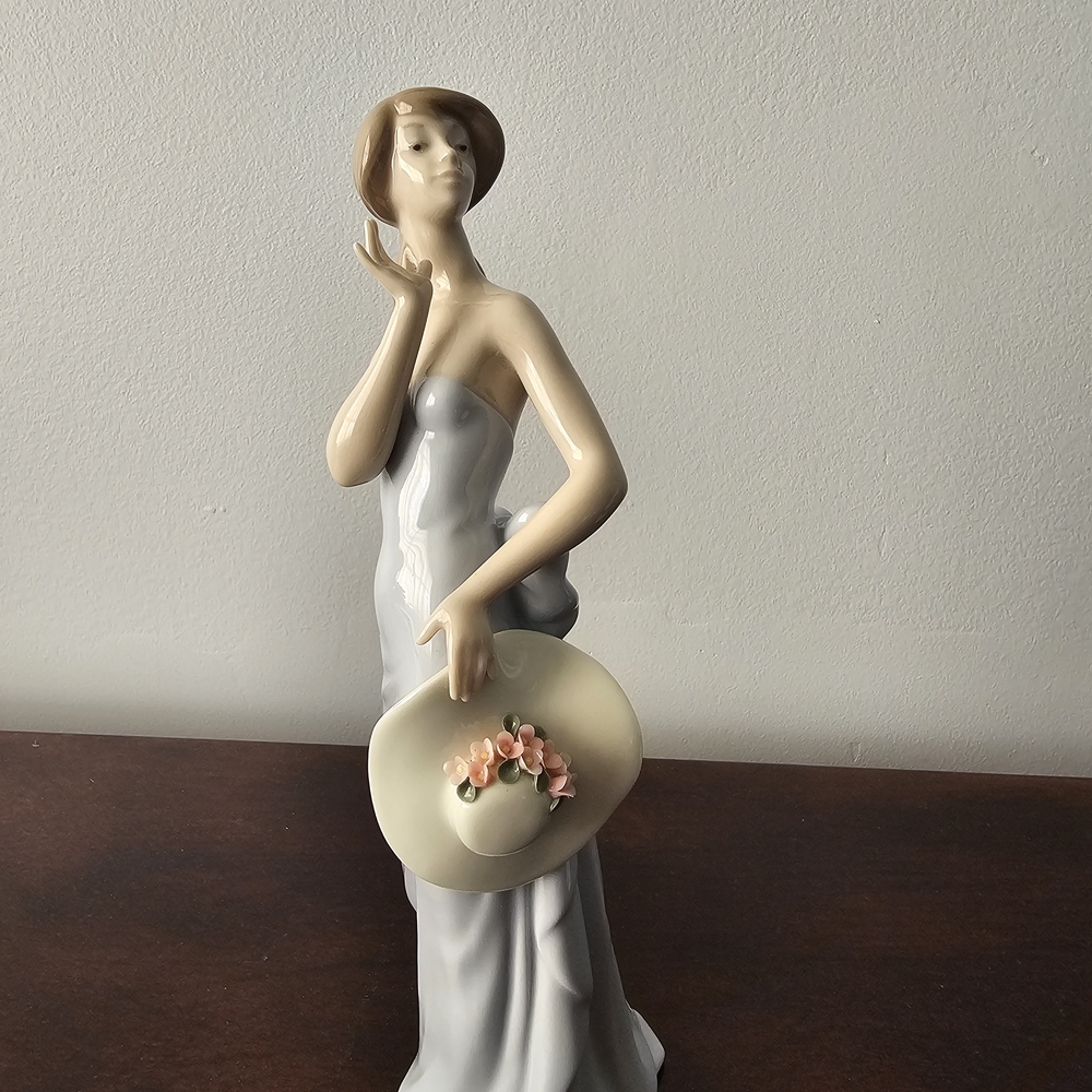Elegant Lady Figurine in White Dress